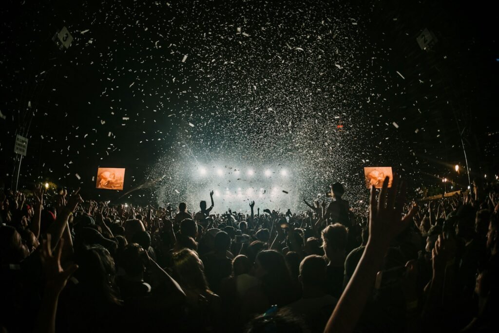 Crowd gathered in front of a festival stage