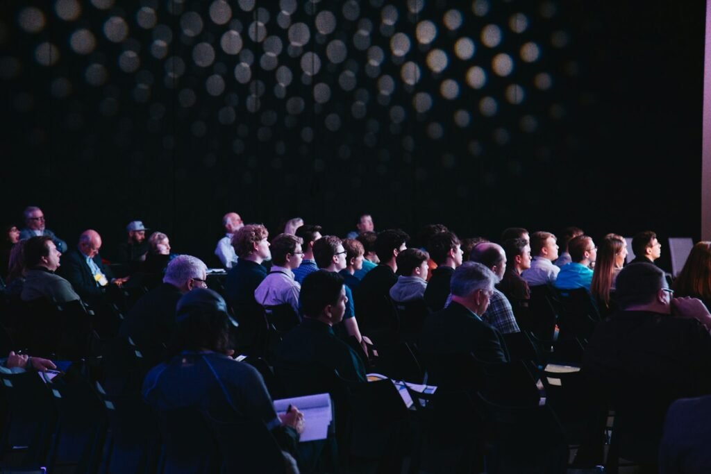 Audience seated at a conference