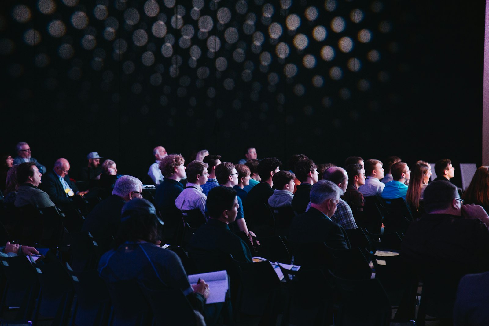 Audience seated at a conference