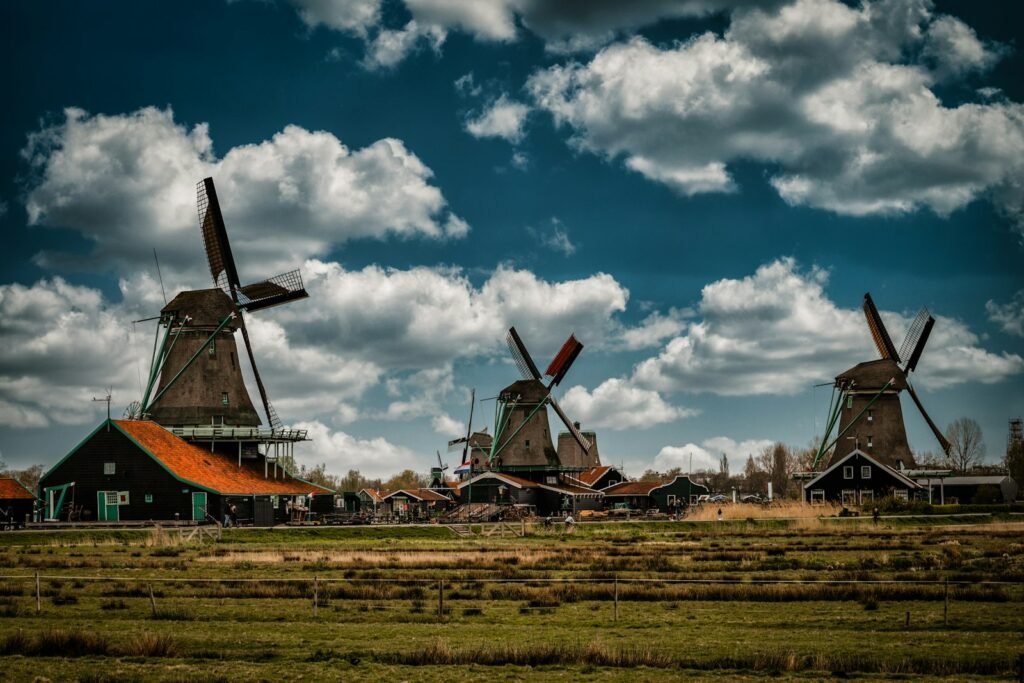 Windmills in a green field