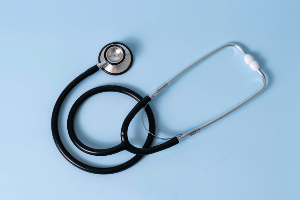 Medical stethoscope on a light blue background