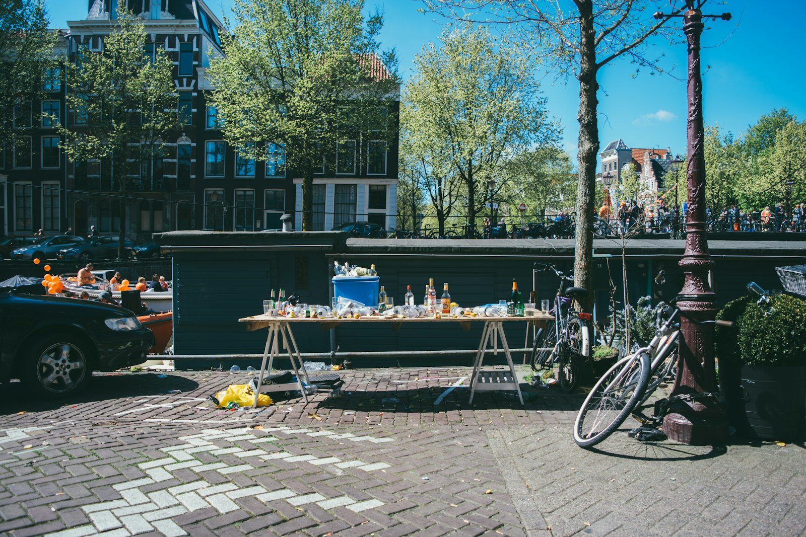 An outdoor market stall on a sunny street