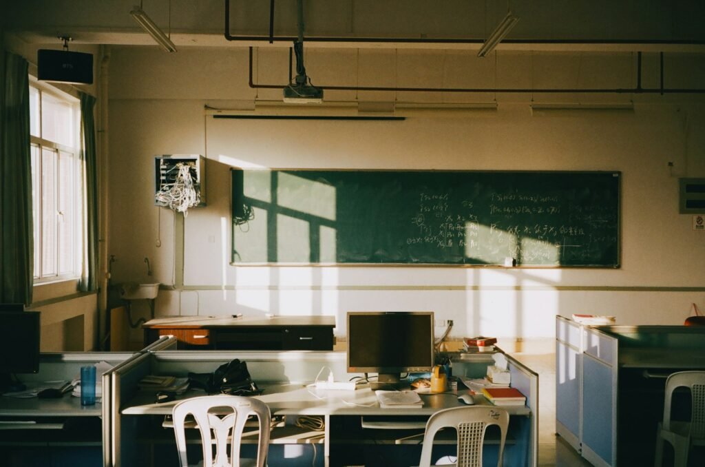 Sunlight streaming into an empty classroom