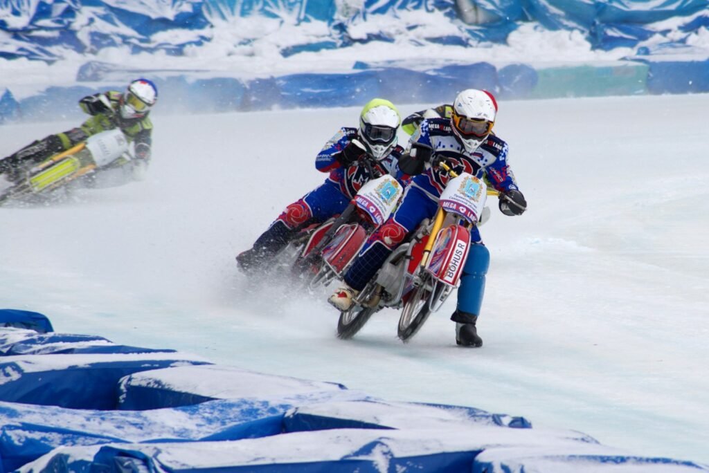Motorcyclists racing on an ice track