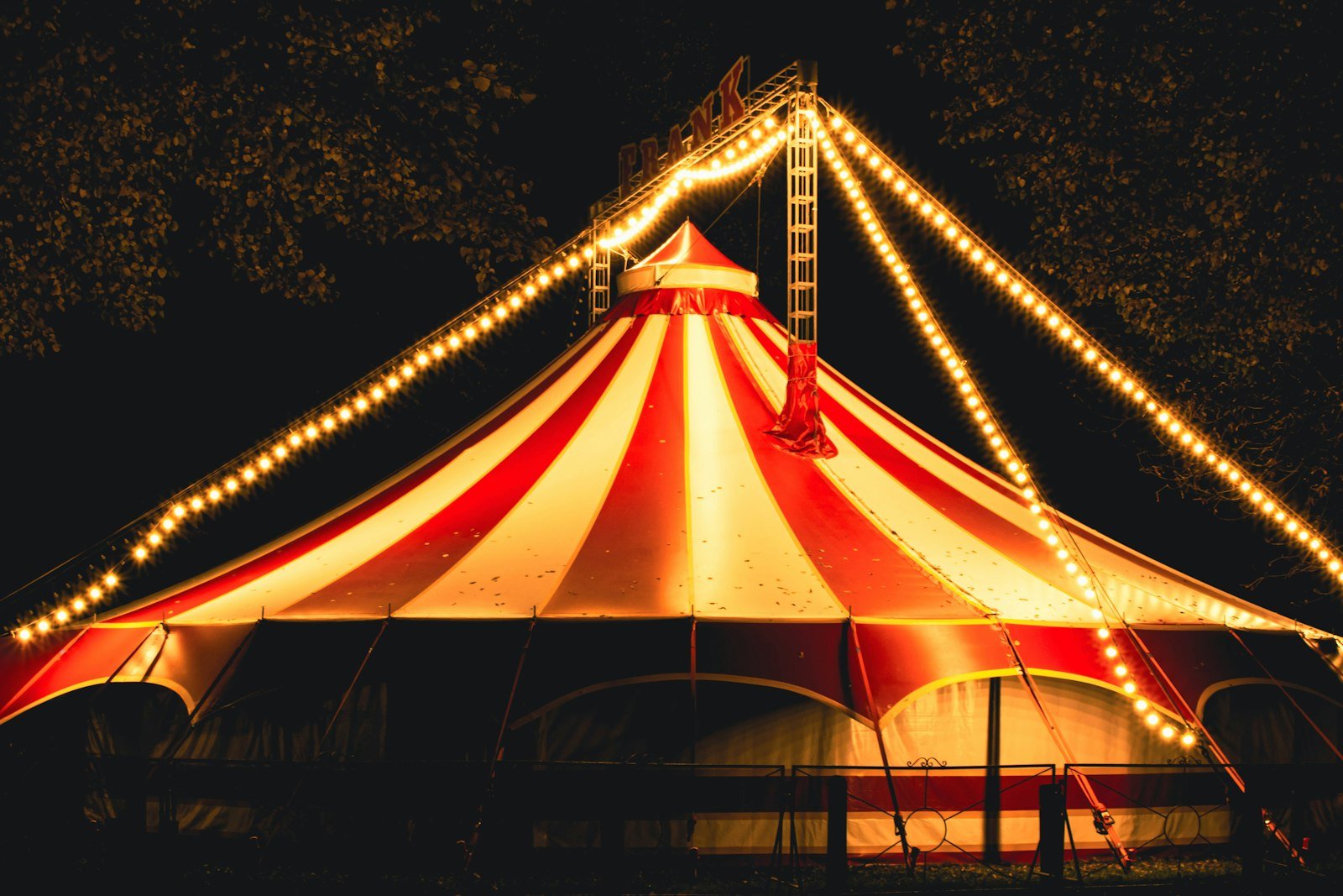 Circus tent lit up with lights