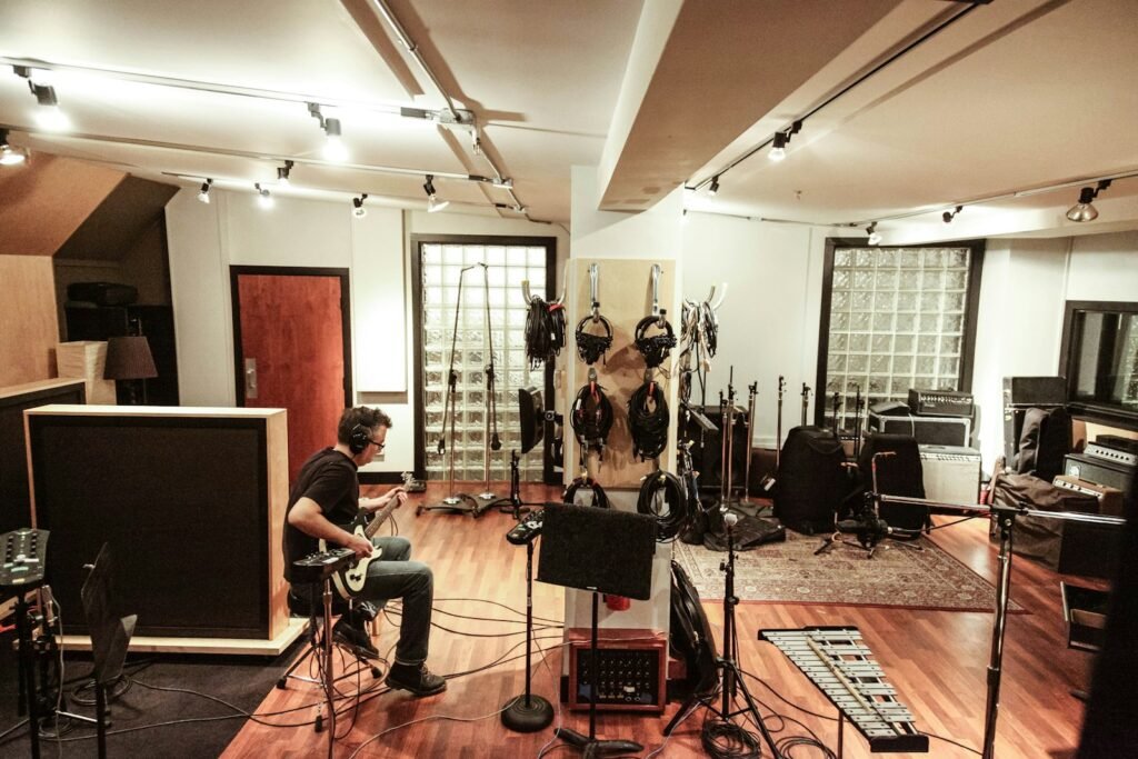 Band rehearsing with instruments in a music studio