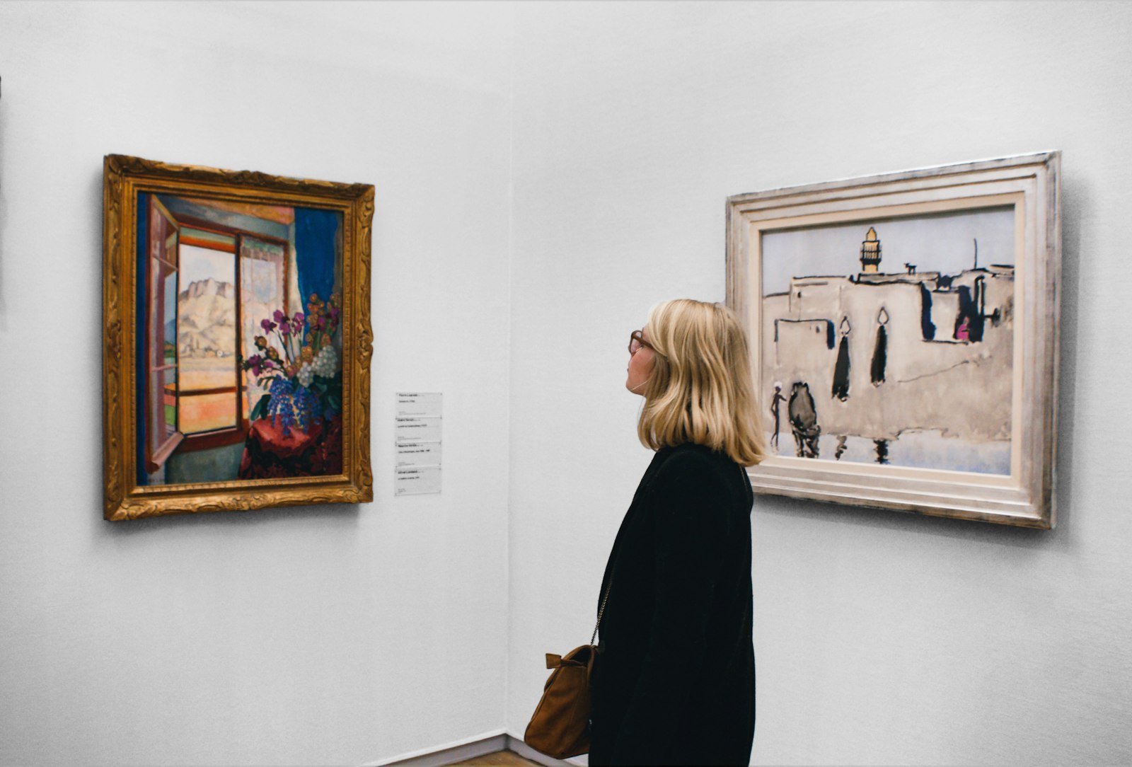 Woman looking at a painting
