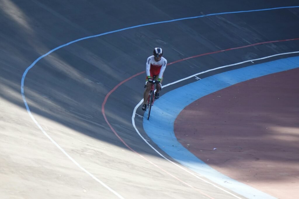 Cyclist racing on a velodrome track