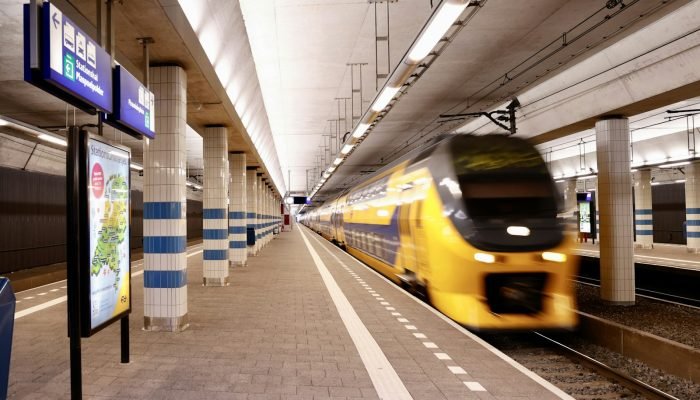 A yellow Dutch train