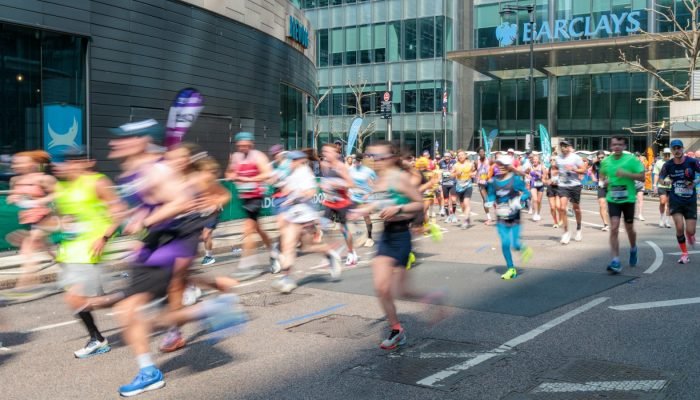 Runners taking part in a marathon on a city street